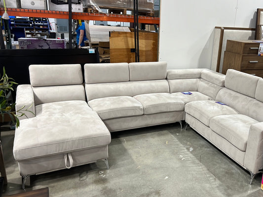 Blaise Fabric Sectional with Storage Chaise ( stains/ one of the feet are missing the plastic bottom )