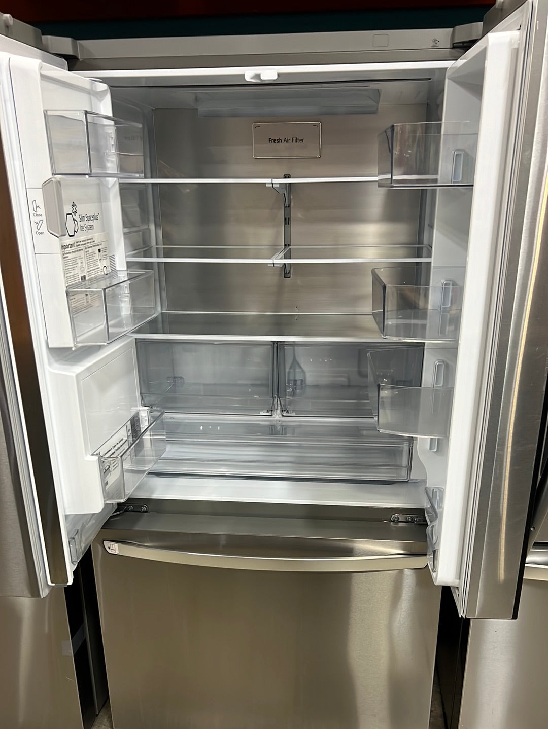 26 cu. ft. Smart Instaview Counter-Depth Max French Door Refrigerator ( scratches on the inside and sides )