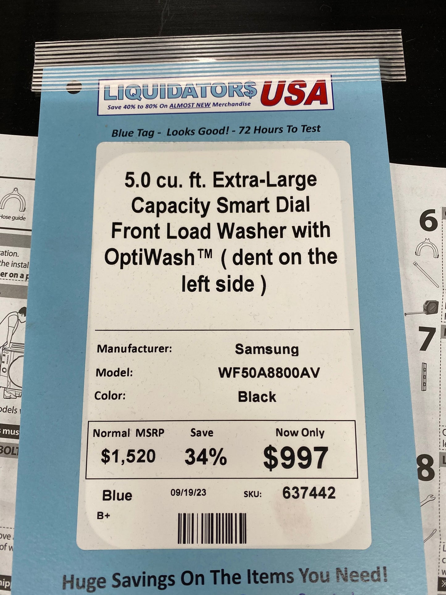 5.0 cu. ft. Extra-Large Capacity Smart Dial Front Load Washer with OptiWash™ ( dent on the left side )